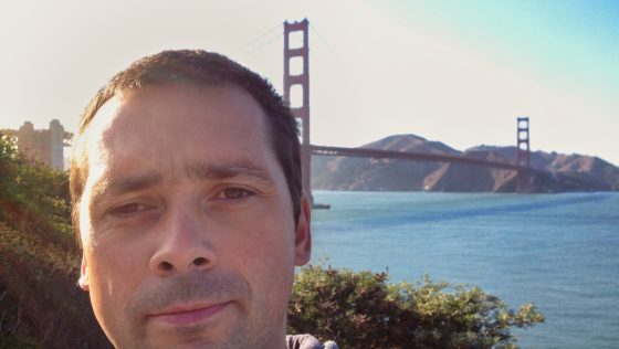 Piotr with the Golden Gate Bridge in the background photo